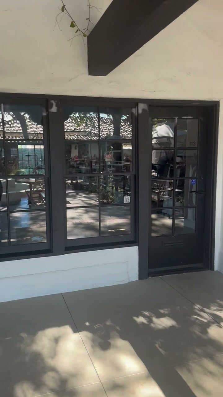 The Suite 113 storefront under the timber arcade today